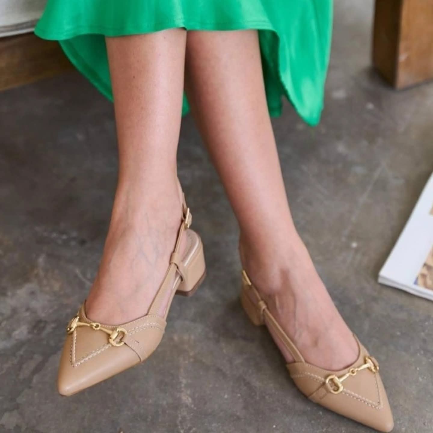 Womens court True allegiance defines in skin, white , green, black and Orange color