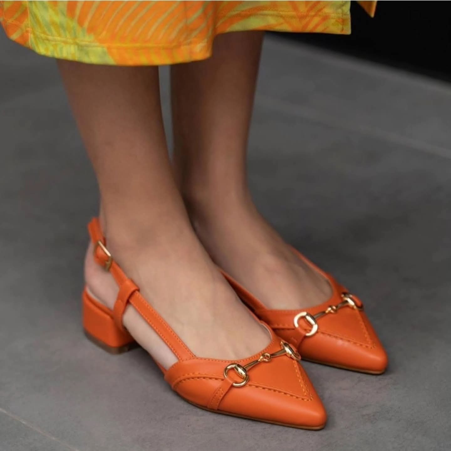 Womens court True allegiance defines in skin, white , green, black and Orange color