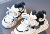Kids black in white shoes