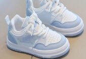 Kids blue in white shoes