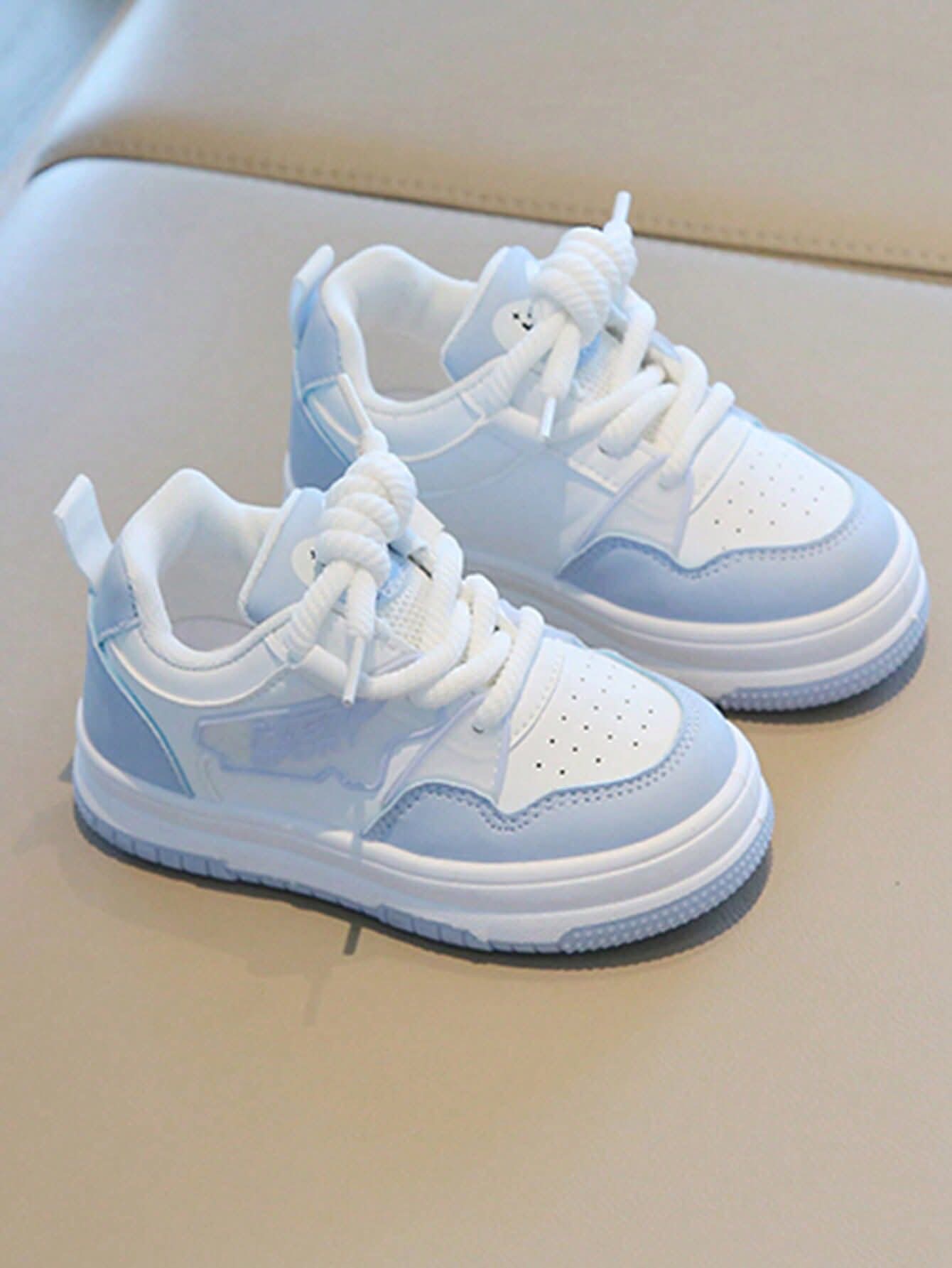 Kids blue in white shoes